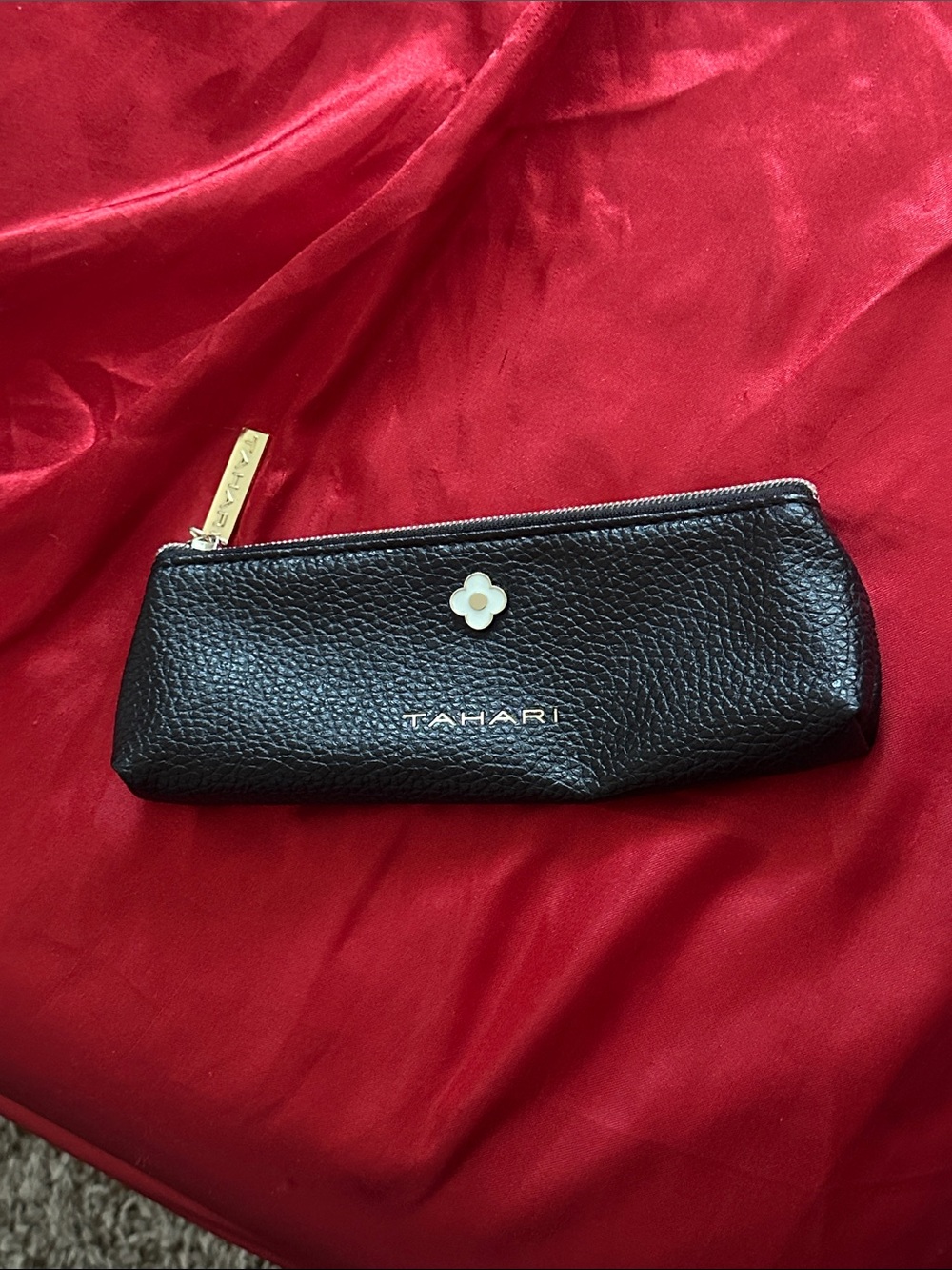 Tahari Black Pebbled Leather Cosmetic Pouch with Floral Accent